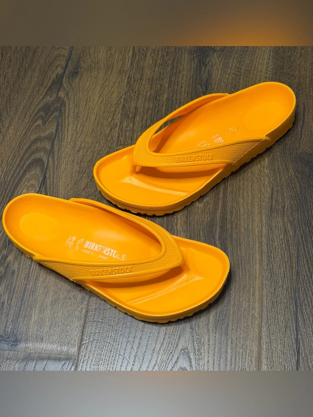 Birkenstock EVA Flip Flops in Bright Orange women’s 39
